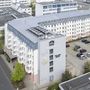 Luftaufnahme des Best Western Hotels Nürnberg City West mit umliegenden Straßen und Parkplätzen.