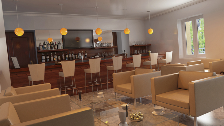 Moderner Hotelbarbereich mit Sitzgelegenheiten und beleuchteter Theke.