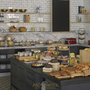 Buffet mit diversen Speisen und Broten im Mövenpick Hotel Den Haag